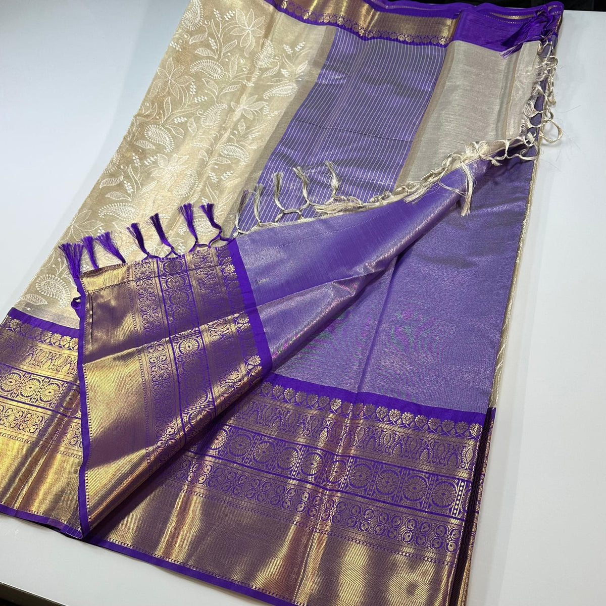 Banarasi tissue embroidery saree with attached blouse